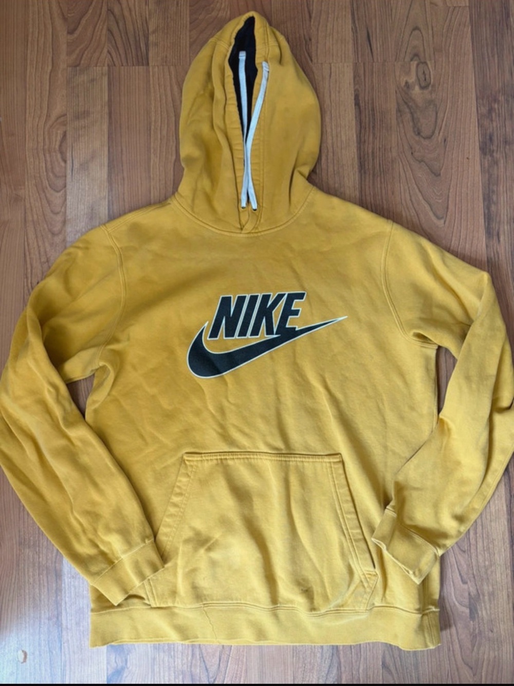 Nike Men's Yellow Hoodie with Black Swoosh Logo. Worn condition